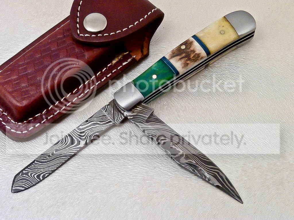 rarae custom made damascus steel dual blade pocke